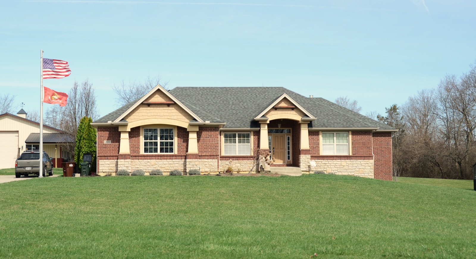 Move-in ready brick home with green lawn freshly listed for sale in Grand Rapids MI